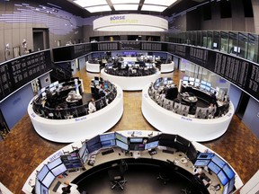 FILE - In this March 27, 2017 file photo, a general view of the trading room at the German stock market pictured in Frankfurt, Germany. New regulations to protect investors, to improve market transparency and honesty, and prevent another financial crisis went into effect on Wednesday, Jan. 3, 2018, in Europe.