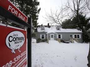 This Monday, Jan. 8, 2018, photo, shows an existing home for sale in Walpole, Mass. On Wednesday, Jan. 24, 2018, the National Association of Realtors reports on sales of existing homes in December.