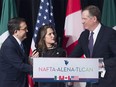 Foreign Affairs Minister Chrystia Freeland talks with United States Trade Representative Robert Lighthizer, right, and Mexico's Secretary of Economy Ildefonso Guajardo Villarrea after delivering statements to the media duirng the sixth round of negotiations for a new North American Free Trade Agreement in Montreal.