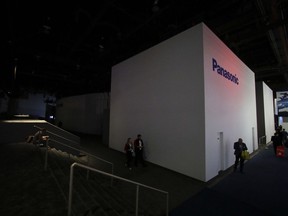 The central hall at the Las Vegas Convention Center is evacuated after a power outage during CES International, Wednesday, Jan. 10, 2018, in Las Vegas.
