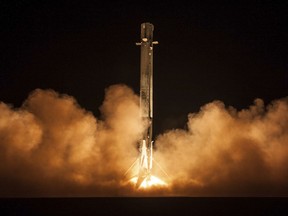 This Sunday, Jan. 7, 2019 photo made available by SpaceX shows the landing of the first stage of the Falcon 9 rocket at Cape Canaveral, Fla., for the "Zuma" U.S. satellite mission. Responding to media reports that the satellite was lost, SpaceX President Gwynne Shotwell says the rocket "did everything correctly" and suggestions otherwise are "categorically false." (SpaceX via AP)