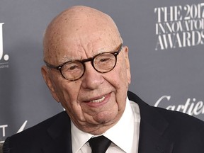 FILE - In this Wednesday, Nov. 1, 2017, file photo, Fox News chairman and CEO Rupert Murdoch attends the WSJ. Magazine 2017 Innovator Awards at The Museum of Modern Art in New York. Murdoch says Facebook should pay fees to "trusted" news producers for their content. Murdoch, whose companies own The Wall Street Journal, Fox News, the New York Post and other media properties, said Monday, Jan. 22, 2018, that publishers are "enhancing the value and integrity of Facebook through their news and content but are not being adequately rewarded for those services."