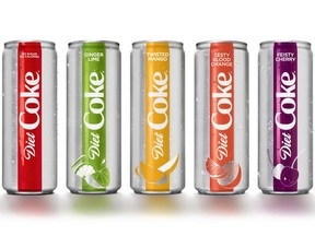 This photo provided by The Coca-Cola Co. shows examples of Diet Coke's rebranding effort. The Coca-Cola Co. says it is adding a slimmer 12-ounce Diet Coke can, refreshing the logo and offering the 35-year-old drink in four new flavors, including mango and ginger lime. The company said Diet Coke's new look and flavors were aimed to appeal to millennials.