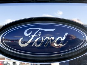 FILE - This Thursday, Nov. 19, 2015, file photo, shows the Ford badge in the grill of a pickup truck. Ford is telling owners of about 2,900 2006 Ranger pickup trucks not to drive them after discovering that a man was killed in a wreck involving an exploding Takata air bag inflator. The death occurred July 1, 2017, in West Virginia.