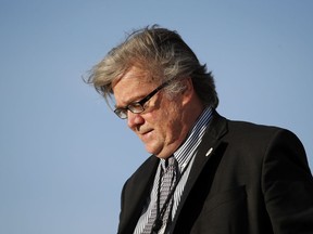 FILE- In this April 9, 2017, file photo, White House chief strategist Steve Bannon steps off Air Force One as he arrives at Andrews Air Force Base, Md. Breitbart News Network announced Tuesday, Jan. 9, 2018, that the former White House chief strategist is stepping down as chairman of the conservative news site.