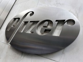 This Monday, Dec. 4, 2017, photo shows the Pfizer company logo at the company's headquarters in New York. Pfizer Inc. reports earnings Tuesday, Jan. 30, 2018.