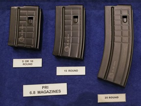 FILE - In this Jan. 16, 2013, file photo, high capacity magazines are seen on display at the 35th annual SHOT Show, Wednesday, Jan. 16, 2013, in Las Vegas. The largest gun industry trade show will be taking place in Las Vegas Jan. 23-26 just a few miles from where a gunman carried out the deadliest mass shooting in modern U.S. history.