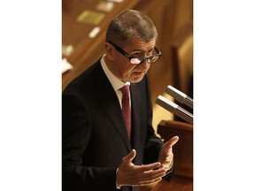 Czech Republic's Prime Minister Andrej Babis addresses lawmakers during a Parliament session in Prague, Czech Republic, Wednesday, Jan. 10, 2018. Czech Republic's Parliament gathered for a confidence vote for a newly appointed government led by Babis.