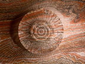 Patterns formed by the cutters of a boring machine in an underground potash mine.