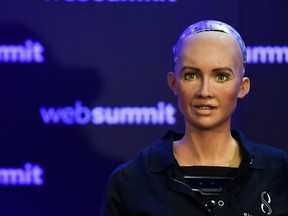 Humanoid "Sophia The Robot" of Hanson Robotics answers questions during a press conference at the 2017 Web Summit in Lisbon on November 7, 2017.