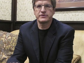 Brian McClendon, a former Uber and Google vice president, answers questions about his campaign for the Democratic nomination for Kansas secretary of state, Monday, Jan. 22, 2018, in Topeka, Kan. McClendon says President Donald Trump's election helped spur him to return to his hometown of Lawrence, Kan., and consider a bid for public office.