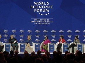 From left, Christine Lagarde, Managing Director of the International Monetary Fund (IWF), Erna Solberg, Prime Minister of Norway, Virginia Rometty, CEO of IBM, Chetna Sinha, President of the Mann Deshi Foundation, Fabiola Gianotti, Director of the European Organization for Nuclear Research (CERN), Sharan Burrow, General Secretary of the International Trade Union Confederation (ITUC) and Isabelle Kocher, CEO of ENGIE, attend a discussion on creating a shared future in a fractured world during the annual meeting of the World Economic Forum in Davos, Switzerland, Tuesday, Jan. 23, 2018.