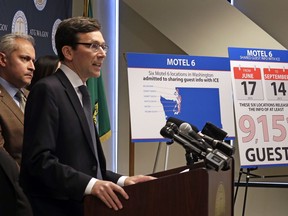 Washington state Attorney General Bob Ferguson addresses a news conference Wednesday, Jan. 3, 2018, in Seattle, announcing that his office is suing Motel 6. Ferguson said that the budget hotel disclosed the personal information of thousands of guests to federal immigration authorities in violation of state law. He said the motel divulged to the U.S. Immigration and Customs Enforcement the names, dates of birth, license plate numbers and room numbers of more than 9,000 guests at six locations throughout the state, violating the state's consumer protection law thousands of times by violating the privacy of its guests.