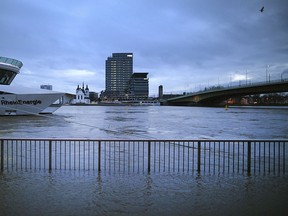 River Rhine floods the embankment  in Cologne, Germany, Sunday, Jan. 7, 2018.