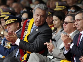 FILE - In this Aug. 10, 2017 file photo, Ecuador' President Lenin Moreno attends a military ceremony marking Independence Day in Quito, Ecuador. Moreno said Wednesday, Jan. 3, 2018, that he will present three candidates to replace Jorge Glas, the ousted vice president, within the next 15 days. Glas is officially out of the job following his conviction on charges of orchestrating a scheme to accept bribes from the Brazilian construction company Odebrecht.