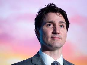 Prime Minister Justin Trudeau listens to a question at a news conference at the AppDirect head office, Thursday, February 8, 2018 in San Francisco.
