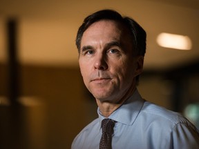 Minister of Finance Bill Morneau speaks to media after meeting with private sector economists, in Toronto on Friday, February 16, 2018.
