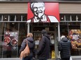 People look into a branch of KFC that is closed due to problems with the delivery of chicken on February 20, 2018 in Bristol, England. KFC has been forced to close hundred of its outlets as a shortage of chicken, due to a failure at the company's new delivery firm DHL, has disrupted the fast-food giant's UK operation and is thought to be costing the fast food chain £1million a day.