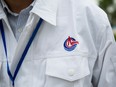 The CNOOC logo on an employee uniform in China.