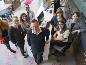 Flight Centre Travel Group. John Beauvais, President Flight Centre Travel Group poses for photos with some employees at their location at King and Spadina streets in Toronto, Ont., Tuesday, February 20, 2018.  (J.P. Moczulski for Postmedia News)