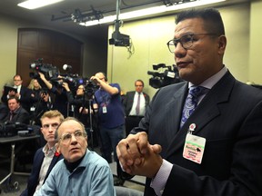 Opaskwayak Cree Nation chief Christian Sinclair asks a question during a provincial announcement on the retail sale and distribution of cannabis at the Manitoba Legislative Building in Winnipeg last year.