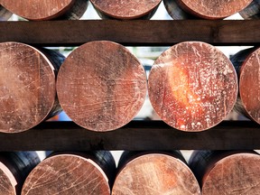 Copper rods sit on storage racks at the Aurubis AG metals plant in Hamburg, Germany. China has accumulated most of the world's copper stocks, with miners and investors trying to figure out what that means for future demand.