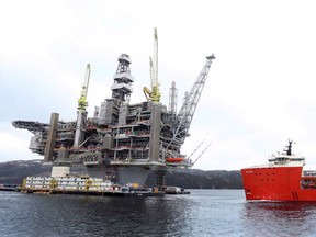 The Hebron Platform, anchored in Trinity Bay, N.L., is shown on Tuesday, April 18, 2017. Cash-strapped Newfoundland and Labrador has announced a 12-year plan to speed and enhance development of its offshore oil and gas resources.