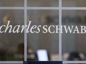 In this July 14, 2010 photo, a Charles Schwab office is shown in Oakland, Calif.