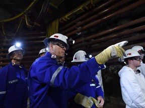 Cameco Corp. says it lost $62 million in its latest quarter compared with a loss of $144 million a year earlier. Cameco CEO Tim Gitzel during a Cameco media tour of the uranium mine in Cigar Lake, Sask., on Wednesday, September 23, 2015.