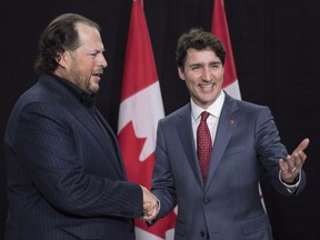 An American customer service management company says it will invest $2 billion in its Canadian business over the next five years. Prime Minister Justin Trudeau meets with Marc Benioff, CEO of Salesforce, at the World Economic Forum in Davos, Switzerland, Wednesday, January 24, 2018.