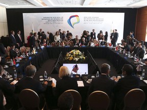 Representatives from the Trans-Pacific Partnership prepare for a meeting in Vina del Mar, Chile, on March 15, 2017. A provision of the newly forged Pacific Rim trade deal would allow the federal or provincial governments to insist that a computer server be hosted on Canadian soil to achieve a public policy goal. Still, one privacy advocate wonders whether the wording would truly help protect sensitive personal data.