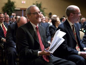 Derek Evans, centre, president and CEO of Pengrowth Energy Trust, laughs at a joke before addressing the company's annual meeting in Calgary on May 11, 2010. The retiring CEO of Pengrowth Energy Corp. says Canadian oil and gas leaders have been too "shy" to speak out in support of their industry and he plans to help fill that vacuum as he leaves the job he's held since 2009. Derek Evans, 61, says he blames himself as much as anyone for a disconnect between average Canadians and the industry in terms of pipeline and drilling technology safety, and the seeming inability of some to see how importing oil and gas hurts domestic producers.