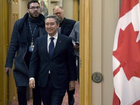 Minister of International Trade Francois-Philippe Champagne arrives to appear before the Senate Committee on Foreign Affairs and International Trade to discuss foreign relations and international trade, within the context of ongoing trade negotiations, including the Trans-Pacific Partnership, on Parliament Hill in Ottawa on Wednesday, Feb. 7, 2018. Auto workers and manufacturers are rejecting assertions by Canada's trade minister that the county won major access for them into the highly-protected Japanese market in the recently rebooted Trans-Pacific Partnership.