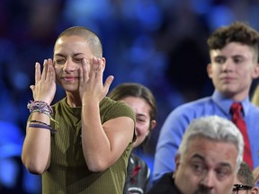 Marjory Stoneman Douglas High School student Emma Gonzalez wipes away tears during a CNN town hall meeting, Wednesday, Feb. 21, 2018, at the BB&T Center, in Sunrise, Fla.