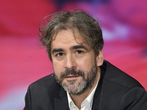 FILE - In this July 21, 2016 file photo German-Turkish journalist Deniz Yucel is pictured during a talkshow in Berlin, Germany. Yucel was imprisoned in Turkey on espionage charges on Feb. 14, 2017.