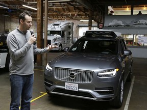 FILE - In this photo taken Tuesday, Dec. 13, 2016, file photo, Anthony Levandowski, then-head of Uber's self-driving program, speaks about their driverless car in San Francisco. A Google-bred pioneer in self-driving cars will collide with Uber's beleaguered ride-hailing service in a courtroom showdown Monday, Feb. 4, 2018, revolving around allegations of deceit, betrayal, espionage and a high-tech heist that tore apart one-time allies.