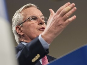 European Union chief Brexit negotiator Michel Barnier addresses the media on Brexit at EU headquarters in Brussels on Friday Feb. 9, 2018. The EU and Britain conducted a seventh round of Brexit negotiations on Friday.