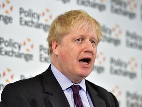 Britain's Foreign Secretary Boris Johnson delivers a speech at the Policy Exchange in London, Wednesday Feb. 14, 2018. The Foreign Office says Johnson will use a speech Wednesday to argue for "an outward-facing, liberal and global Britain" after the U.K. leaves the bloc.