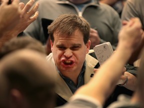 Traders signal offers in the S&P options pit at the Cboe Global Markets, Inc. exchange in Chicago.