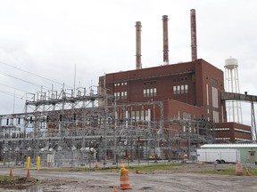 FILE - This April 7, 2016, file photo, shows the exterior of Consumers Energy's J.R. Whiting Generating Plant in Luna Pier, Mich. Consumers Energy will phase out electricity production from coal by 2040 to slash emissions of heat-trapping gases that cause global warming, the Michigan utility's president and CEO told The Associated Press.