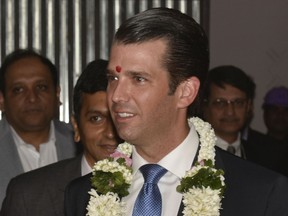 Donald Trump Jr, the eldest son of President Donald Trump, attends an event at the Trump Tower in Mumbai, India, Thursday, Feb. 22, 2018. For over a week the front pages of many Indian newspapers have promised that buyers who put down a deposit for an apartment in the new Trump Towers in a New Delhi suburb will get to spend Friday evening being wined and dined by Trump Jr. But the money had to be paid, the ads said, before Thursday. (AP Photo)