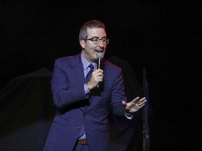 FILE - In this Nov. 7, 2017 file photo, comedian John Oliver performs at the 11th Annual Stand Up for Heroes benefit in New York. A West Virginia judge has dismissed a lawsuit filed against HBO host John Oliver brought by coal company Murray Energy. A segment of Oliver's show "Last Week Tonight" in June poked fun at Murray Energy CEO Robert Murray, who blames regulatory efforts by the Obama administration for damaging the coal industry. Oliver said the 77-year-old looked like a "geriatric Dr. Evil."  A Circuit Court judge in Marshall County, W. Va., ruled on Wednesday, Feb. 21, 2018 that Murray's company failed to state a claim.