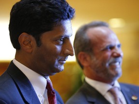FILE - In this Monday, June 5, 2017 file photo, Suresh Chawla, left, of Chawla Hotels and Eric Danziger, CEO of Trump Hotels, are shown in New York, at a launch event for four new Trump hotels being built in Mississippi. Chawla Hotels, a Mississippi developer that has joined with the Trump Organization to open the first of possibly dozens of hotels in the U.S. president's new mid-priced chain has applied for millions of dollars of state tax breaks.