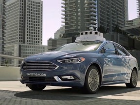 In this undated image made from a video provided by Ford Motor Co. a self-driving vehicle from Ford Motor Co. and Ford partner Argo AI drives in Miami, Fla. Ford is making Miami-Dade County its new test bed for self-driving vehicles. (Ford Motor Co. via AP)