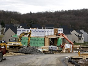 In this March 1, 2017, photo new home construction is underway in a housing plan in Zelienople, Pa. On Friday, Feb. 16, 2018, the Commerce Department reports on U.S. home construction in January.