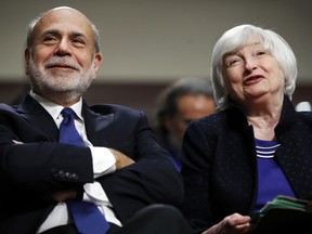 FILE - In this Tuesday, Nov. 7, 2017, file photo, former Federal Reserve Chair Ben Bernanke, left, and Federal Reserve Chair Janet Yellen attend a ceremony awarding them both with the Paul H. Douglas Award for Ethics in Government, on Capitol Hill in Washington. Yellen's last day at the Fed is Friday, Feb. 2, 2018. Then she will start a new job on Monday, Feb. 5 at the Brookings Institution, where one of her colleagues will be Bernanke.