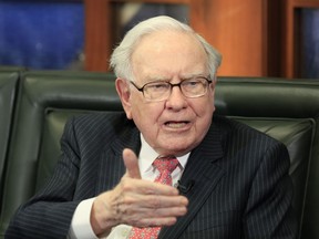 FILE - In this May 8, 2017, file photo, Berkshire Hathaway Chairman and CEO Warren Buffett speaks during an interview with Liz Claman of the Fox Business Network in Omaha, Neb. Berkshire Hathaway reports financial results Saturday, Feb. 24, 2018.