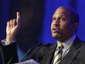 FILE - In this May 29, 2014 file photo, author and talk show host Tavis Smiley speaks at Book Expo America in New York. Smiley is suing his former employer, the Public Broadcasting Service, for breach of contract after he was fired over sexual harassment allegations. The Washington Post reports that the lawsuit was filed Tuesday, Feb. 20, 2018, in D.C. Superior Court against PBS, based in the Washington suburb of Arlington, Virginia.