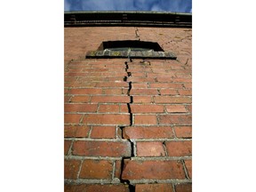 A crack in the wall of a farm in Hunzinge, northern Netherlands, Friday, Jan. 19, 2018. More than 3,000 homes in Groningen province are facing reinforcement or even in some cases demolition because of a series of small tremors caused by decades of gas extraction and the Dutch government is being forced to confront the possibility of a future without locally produced gas years earlier than expected.