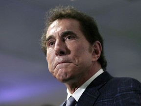 FILE - This March 15, 2016, file photo shows casino mogul Steve Wynn at a news conference in Medford, Mass. A woman has told police she had a child with Wynn after he raped her, while another has reported she was forced to resign from a Las Vegas job after she refused to have sex with him.
